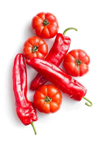 Röda tomater och paprika — Stockfoto