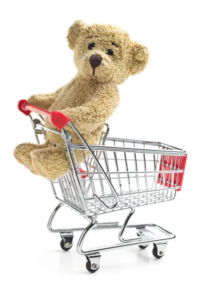 Medvídek s nákupní košík — Stock fotografie
