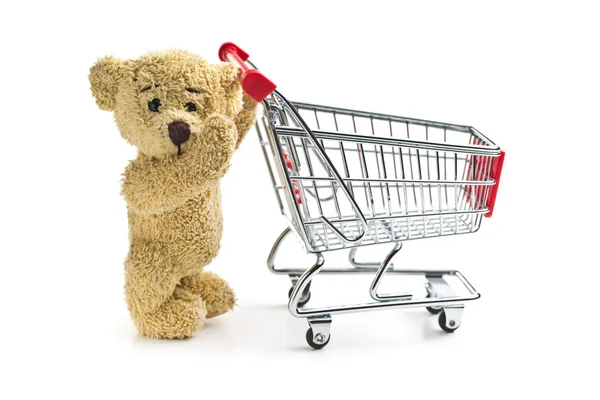 Teddybeer met winkelwagen — Stockfoto