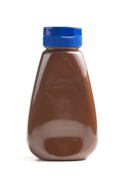 Sweet chocolate in bottle — Stock Photo, Image