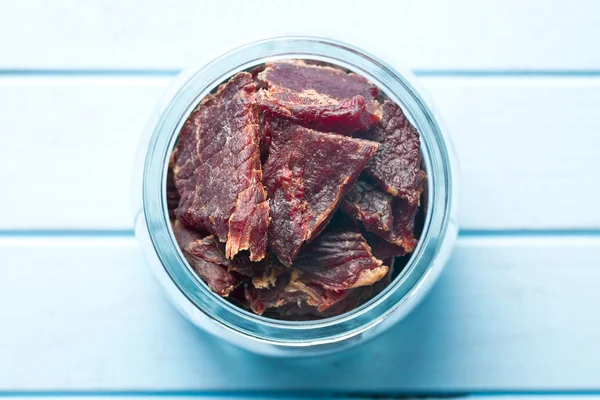 Beef jerky in jar — Stock Photo, Image