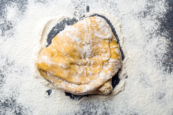 Piece of kneaded raw dough — Stock Photo, Image