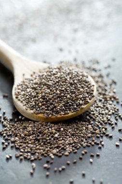 chia seeds in wooden spoon clipart