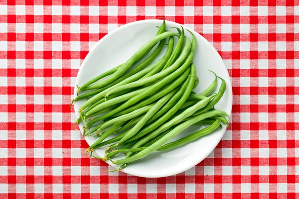 Green beans on plate — Stock Photo, Image