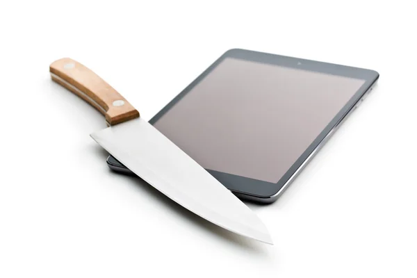 Ordinateur tablette et couteau — Photo