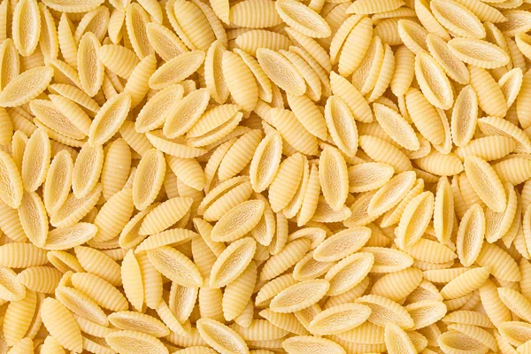 Uncooked italian pasta — Stock Photo, Image