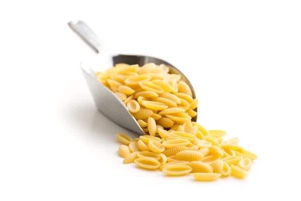 Pasta italiana cruda en cuchara —  Fotos de Stock