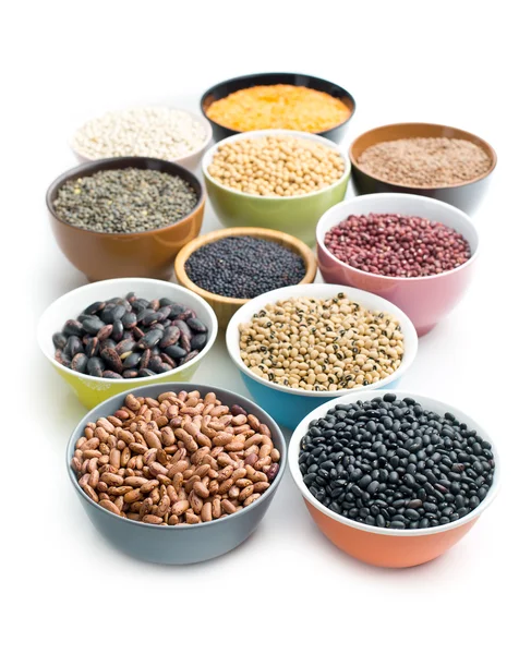 Various legumes in bowls — Stock Photo, Image