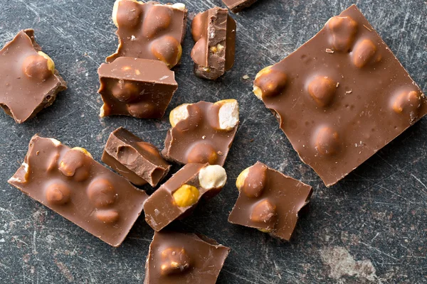 Sweet chocolate with hazelnuts — Stock Photo, Image
