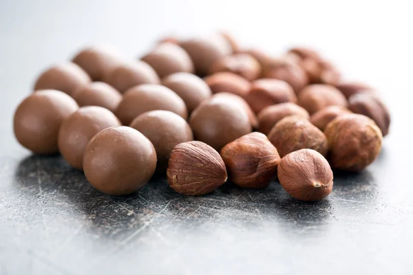 Hazelnuts in chocolate — Stock Photo, Image