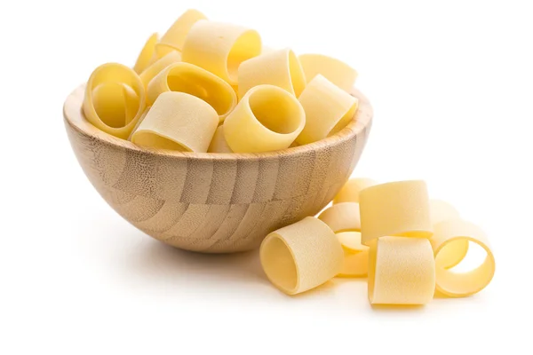 Uncooked pasta calamarata in bowl — Stock Photo, Image