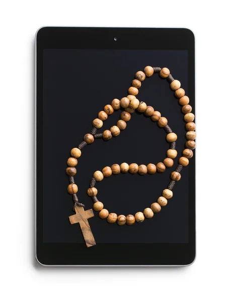 Wooden rosary beads with computer tablet — Stock Photo, Image