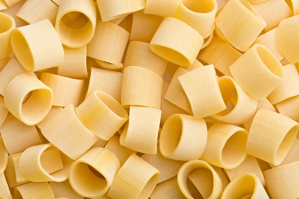 Uncooked pasta calamarata — Stock Photo, Image