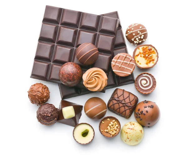 Various chocolate pralines and chocolate bar — Stock Photo, Image