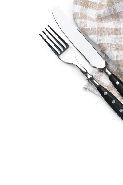 Knife, fork and checkerd napkin — Stock Photo, Image