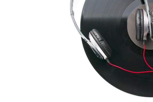 Headphones and vinyl record — Stock Photo, Image