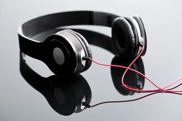Black wired headphones — Stock Photo, Image