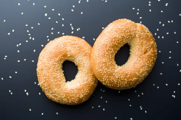 Tasty bagel with sesame seed — Stock Photo, Image