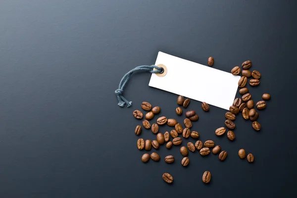 Coffee beans and price label — Stock Photo, Image