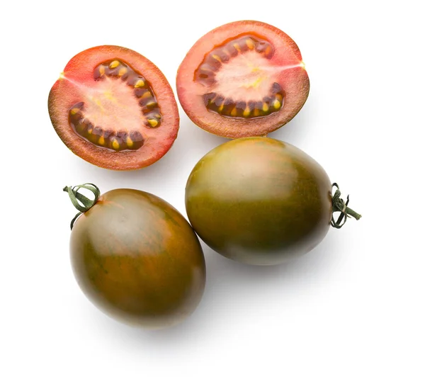 Halbierte dunkle Tomaten — Stockfoto