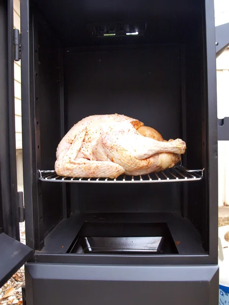 Turkey in a propane smoker — Stock Photo, Image