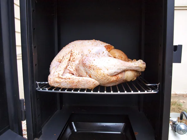 Turkey in a propane smoker — Stock Photo, Image