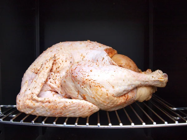 Turkey in a propane smoker — Stock Photo, Image