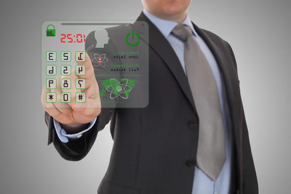 Business man pressing an imaginary button Stock Photo