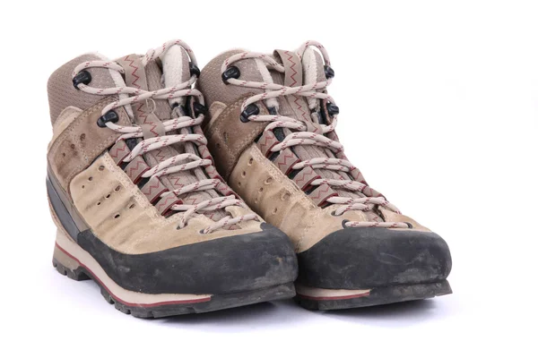 Used hiking boots isolated on white background — Stock Photo, Image
