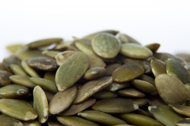 Kabak Çekirdeği closeup görünümünü düz bir arka plan üzerinde