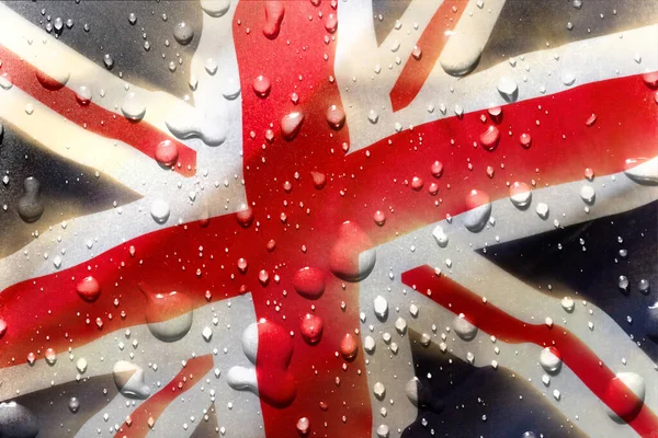 Water drops on a union jack flag. United Kingdom national patriotic symbol adopted in 1801