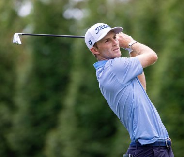 CHARLOTTE, NC, USA  - May 4, 2021: Will Zalatoris hits a drive as he plays in the 2021 Wells Fargo Championship. clipart