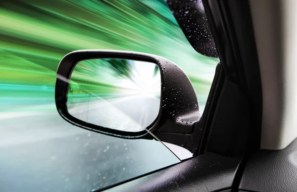 Rear-view mirror of speed car — Stock Photo, Image