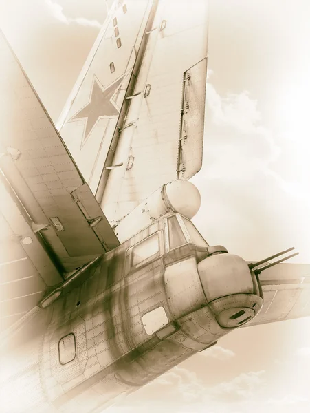 Old Soviet bomber in clouds — Stock Photo, Image