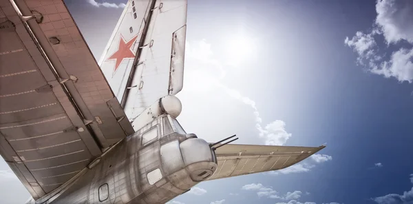 Old Soviet bomber in clouds — Stok Foto