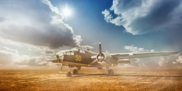 Old bomber in cloud of dust in the open field Royalty Free Stock Photos