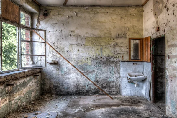 Sanitary spot in abandoned factory — Stock Photo, Image