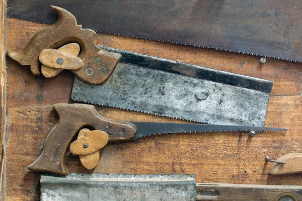 Set of various old and used hand saws — Stock Photo, Image