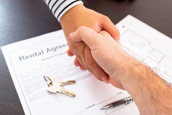 Signing rental agreement contract Stock Picture