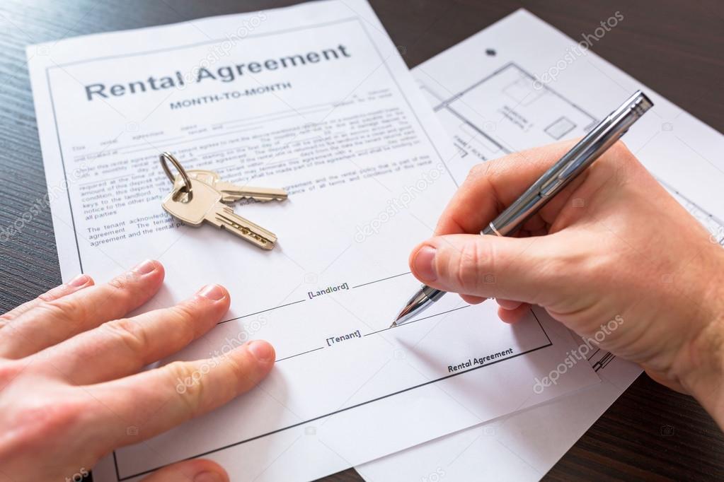 Signing rental agreement contract