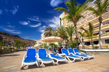 Tourists on sun holidays at the Lago Taurito aquapark in Taurito, Gran Canaria