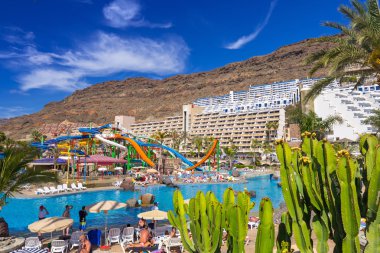 Tourists on sun holidays at the Lago Taurito aquapark in Taurito, Gran Canaria