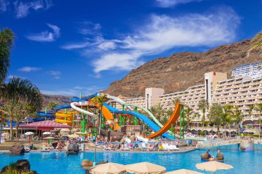 Tourists on sun holidays at the Lago Taurito aquapark in Taurito, Gran Canaria