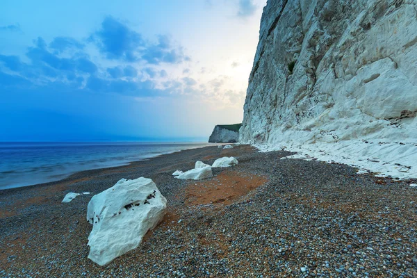 White cliffs on the Jurassic Coast of Dorset at sunset Royalty Free Stock Images