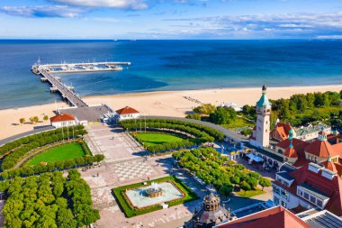 The sunny scenery of Sopot city and Molo - pier on the Baltic Sea. Poland clipart