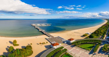 Aerial view of the Baltic sea coastline and wooden pier in Sopot, Poland clipart