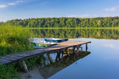 Jetty on the masurian lake clipart