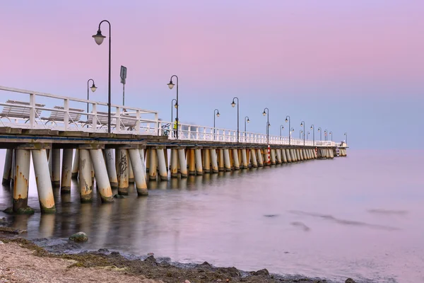 Baltic pier in Gdynia Orlowo at dusk — Stock Photo, Image