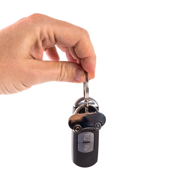 Férfi kezében egy autó kulcs — Stock Fotó