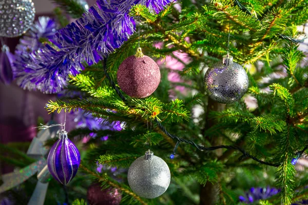 Beautiful purple and silver baubles — Stock Photo, Image